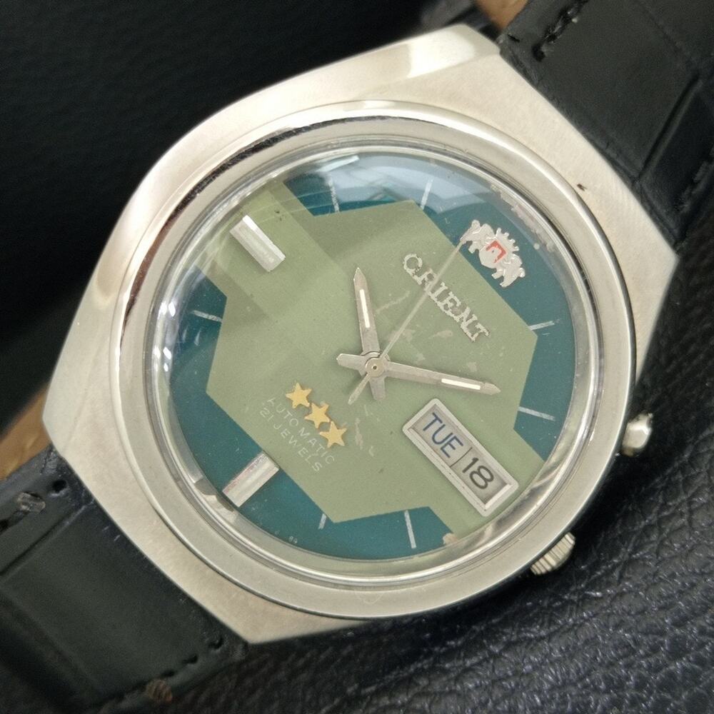 Vintage 1978 Orient Automatic Mens Silver Watch W/daydate & Green accents